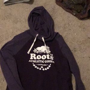 Roots: purple turtle neck sweater